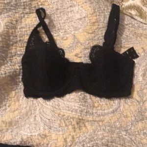 Triumph black lace bra.